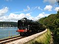 the one-off 71000 Duke of Gloucester running beside the River Dart on the Dartmouth Steam Railway