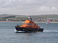The Weymouth Lifeboat 17-32 Ernest and Mabel crossing Weymouth Bay on the way back to its station
