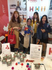 students at host stand China Education Expo CEE