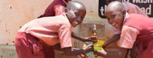Ung'atani-Primary-School-children-with-safe-water,-Kenya