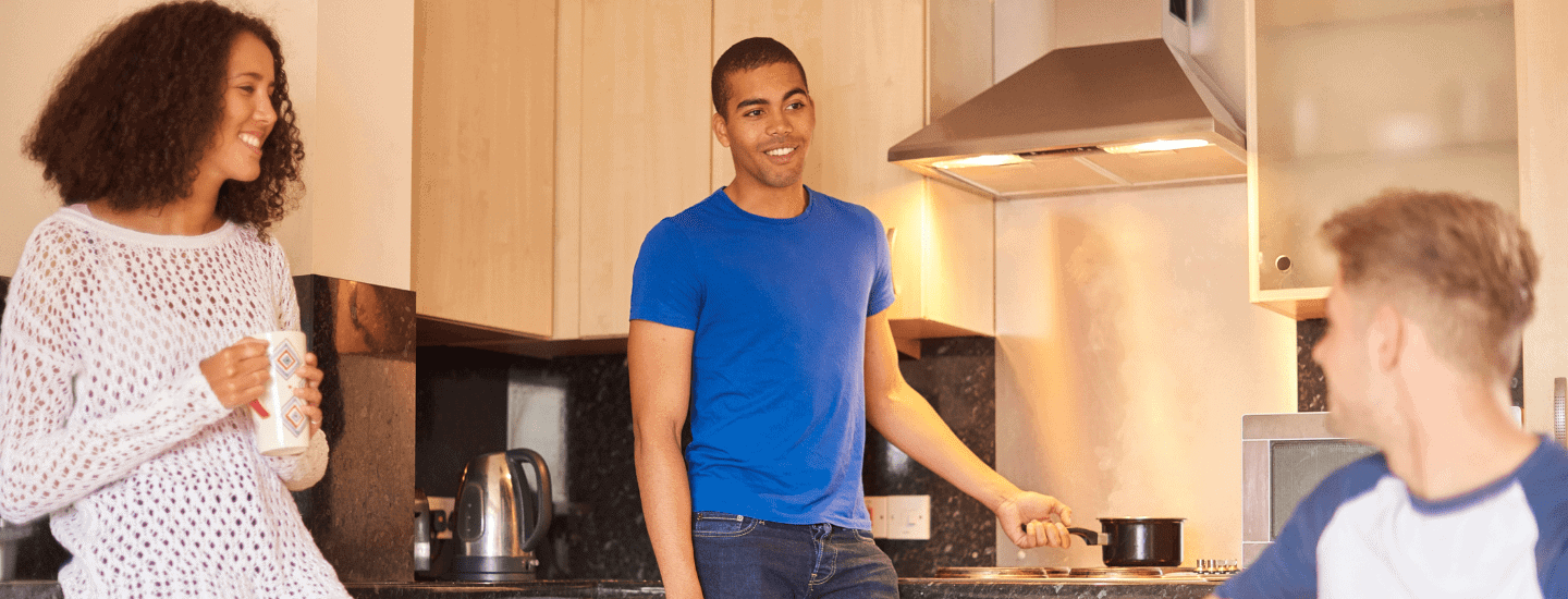 Students cooking in student accommodation